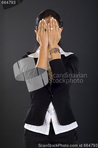Image of businesswoman in the See No Evil pose