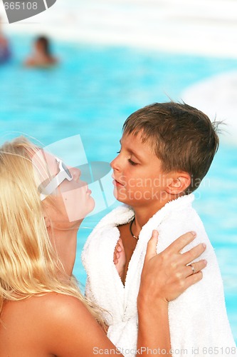 Image of mom and son near the swimming pool