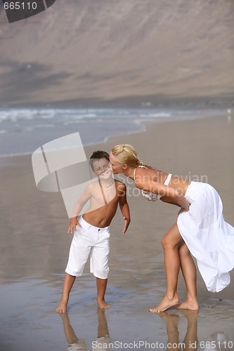 Image of Mother and son on the beach