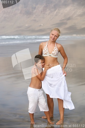 Image of Happy Mother and son on the beach
