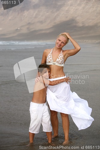 Image of Happy Mother and son on the beach