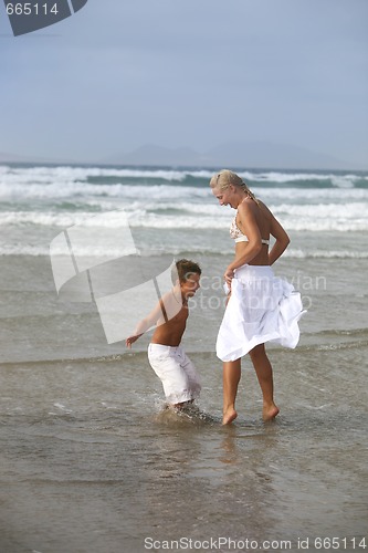 Image of Happy Mother and son on the beach