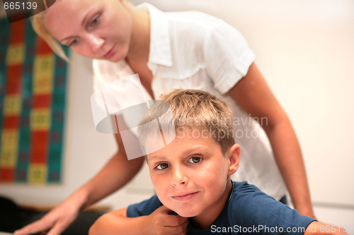 Image of young mats student with teather in the classroom