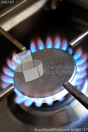 Image of Lit gas cooker ring