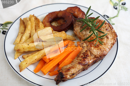 Image of Pork chop cooked in wine with apples