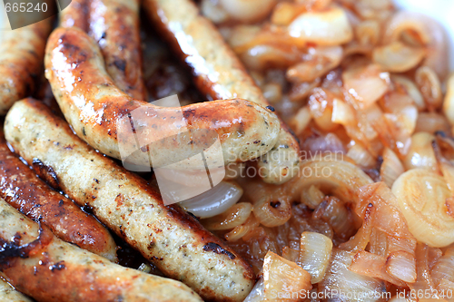 Image of Fried sausages and onion