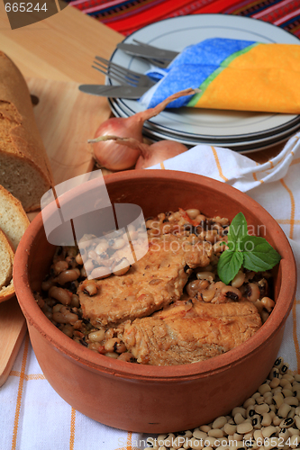 Image of Pork and beans in bowl vertical