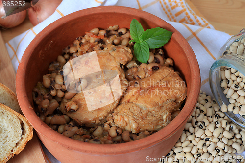 Image of Pork and beans in bowl horizontal