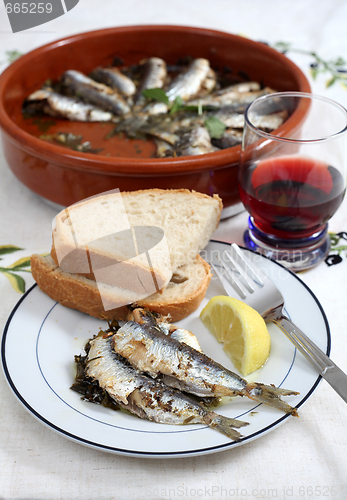 Image of Fresh baked sardines vertical