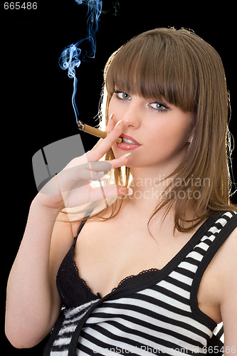 Image of Portrait of the young woman with a cigar. Isolated