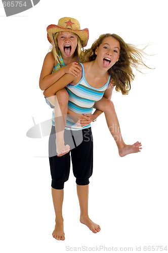 Image of playful young naughty sisters having fun