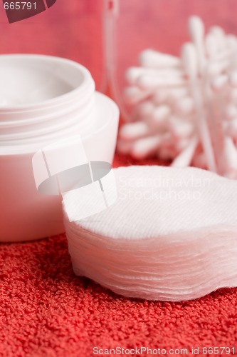 Image of cream and cotton pads