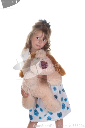 Image of Little girl playing with toy