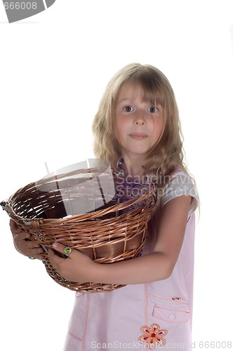 Image of Little girl playing with basket