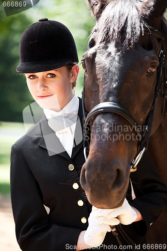 Image of Horseback riding girl