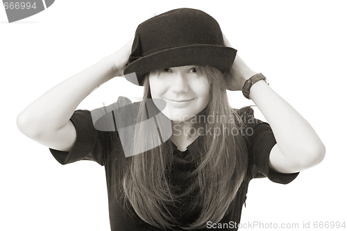 Image of smiling young woman in black hat