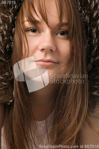 Image of young woman in fur hat