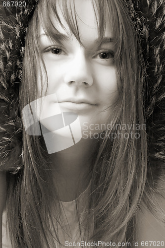 Image of young woman in fur hat