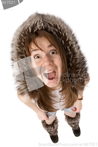 Image of very surprised woman in fur hat