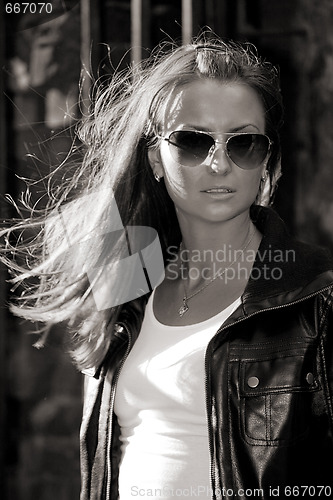 Image of young girl in sunglasses