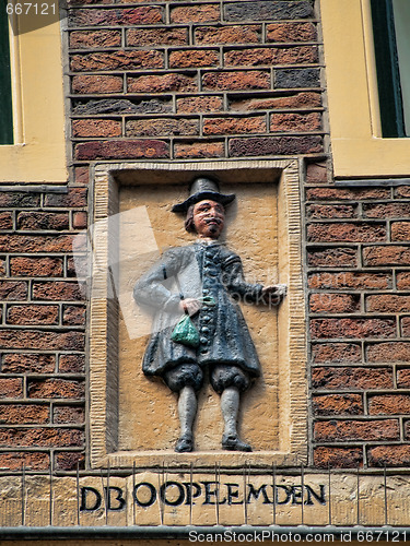 Image of Amterdam wall statue