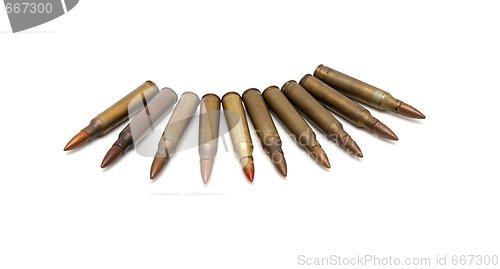 Image of Arch of spread M16 cartridges isolated 