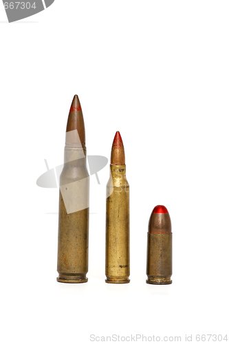 Image of Three red-tipped tracer cartridges of various calibers isolated