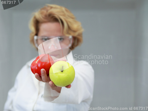 Image of Female scientist offering natural food