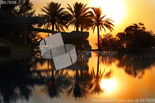 Image of Sunrise over swimming pool