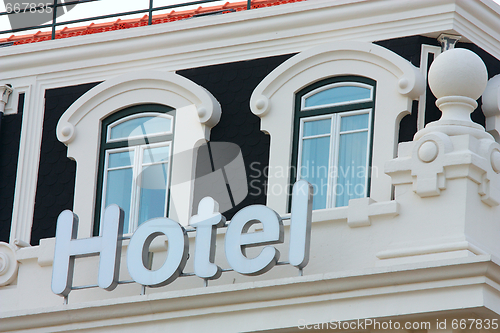 Image of Hotel Sign and Windows