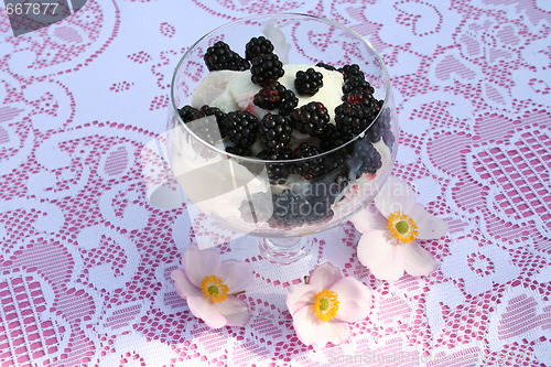 Image of Dessert with blackberries and ice-cream