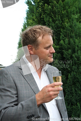 Image of Swedish man with a glass of champagne