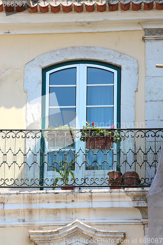 Image of Old window of traditional fisherman houses of Lisbon, Portugal