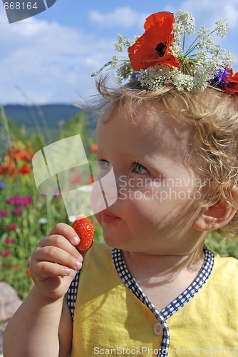 Image of girl eating strawberries