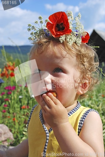 Image of girl eating strawberries