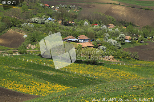 Image of Romanian vilage between the hills