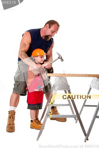 Image of Father teaching son construction
