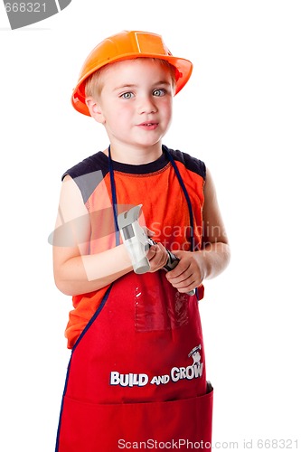 Image of Cute boy with hammer