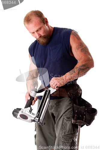 Image of Man with nail gun