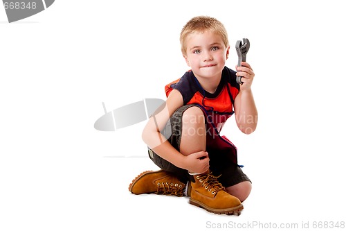 Image of Boy with wrench