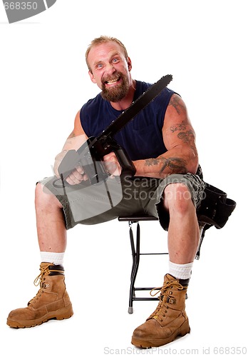 Image of Crazy guy with chainsaw