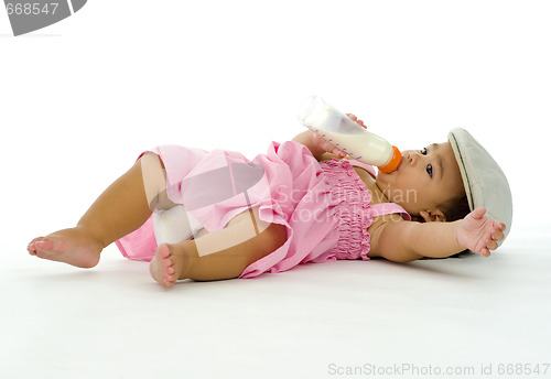 Image of little girl drinking milk