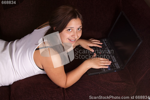 Image of Teen age girl on laptop