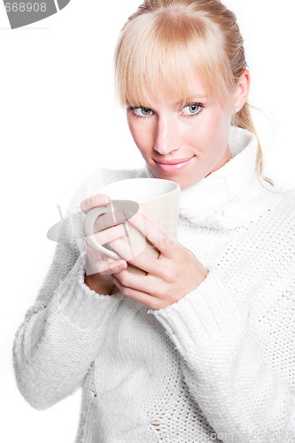 Image of Beautiful woman holding coffee cup