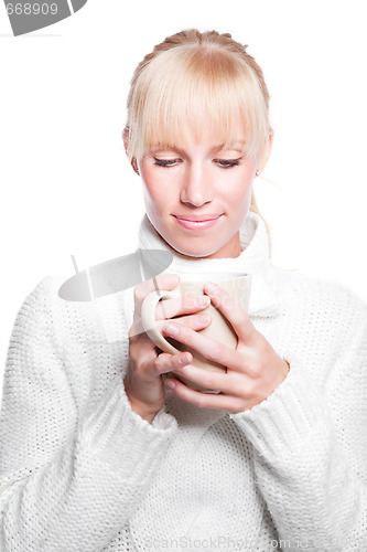 Image of Beautiful woman holding coffee cup
