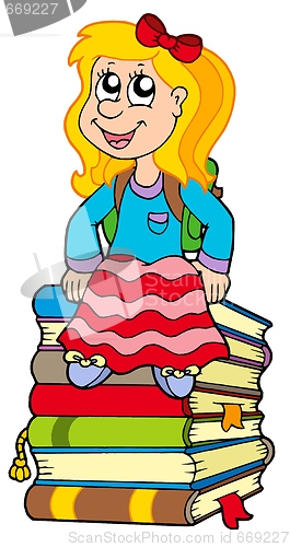 Image of Girl sitting on pile of books