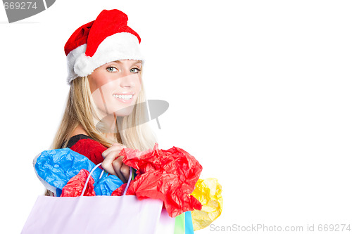 Image of Christmas shopping santa girl