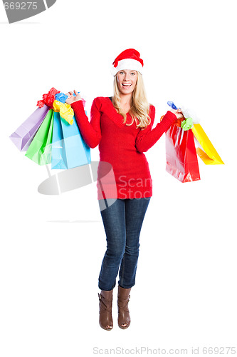 Image of Christmas shopping santa girl