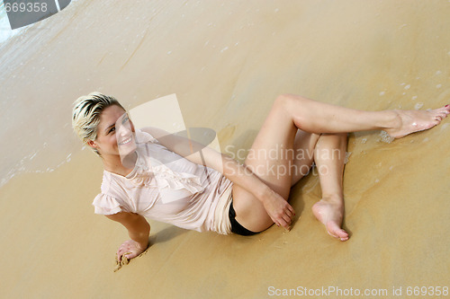 Image of Blond woman at the beach.