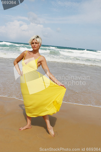 Image of Blond woman at the beach.